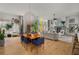 Spacious living and dining area featuring large windows, modern lighting, and a comfortable layout at 845 Spring Nw St # Ph4, Atlanta, GA 30308