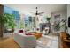 Bright living room featuring floor-to-ceiling windows and a modern fireplace with comfortable seating at 845 Spring Nw St # Ph4, Atlanta, GA 30308