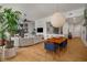 Bright open-concept living space with a modern kitchen and dining area, perfect for entertaining and relaxing at 845 Spring Nw St # Ph4, Atlanta, GA 30308