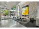 Bright lobby with high ceilings, stone accent wall, and modern decor creates a welcoming entrance at 845 Spring Nw St # Ph4, Atlanta, GA 30308