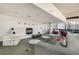 Comfortable lounge featuring modern decor, a fireplace, and cityscape views creating an inviting atmosphere at 845 Spring Nw St # Ph4, Atlanta, GA 30308