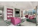 Stylish lounge area with comfortable seating, built-in shelving, and modern decor perfect for relaxing at 845 Spring Nw St # Ph4, Atlanta, GA 30308