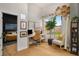Home office with a desk, chair, decor, and large window with a city view at 845 Spring Nw St # Ph4, Atlanta, GA 30308