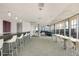 Large recreation room with a bar, tables, and lounge area, ideal for socializing and events at 845 Spring Nw St # Ph4, Atlanta, GA 30308