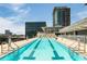 Rooftop pool with lap lanes and lounge area, offering stunning city views and an urban oasis at 845 Spring Nw St # Ph4, Atlanta, GA 30308