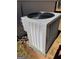 Exterior shot of a well-maintained air conditioning unit at 955 Loch Forest Way, Riverdale, GA 30296