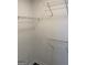 Walk-in closet with multiple shelving units for storage at 955 Loch Forest Way, Riverdale, GA 30296
