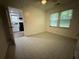 Bedroom featuring patterned floors, natural light and a doorway to the kitchen at 247 Whitaker Nw Cir, Atlanta, GA 30314
