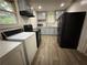 Kitchen appliances include a microwave, oven and washer and dryer at 247 Whitaker Nw Cir, Atlanta, GA 30314
