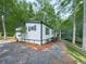 Home exterior featuring fresh paint, a small front porch and an established yard at 337 Theodore Cox Cir, Canton, GA 30114