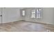 Living room with light wood flooring and is freshly painted at 337 Theodore Cox Cir, Canton, GA 30114