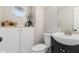 Well-lit bathroom featuring modern fixtures, a vanity, and ample storage space for a clean, updated look at 4706 Cedar Park Trl, Stone Mountain, GA 30083