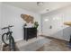 Entryway with double doors, a modern light fixture, an area rug, and a decorative display on the wall at 4706 Cedar Park Trl, Stone Mountain, GA 30083
