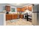 Functional kitchen with stainless steel appliances, ample counter space, and plenty of storage at 4706 Cedar Park Trl, Stone Mountain, GA 30083