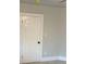 Bedroom featuring new gray laminate flooring and a freshly painted neutral wall at 1053 Metropolitan Parkway Southwest Sw Pkwy, Atlanta, GA 30310