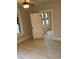 Bedroom featuring new gray laminate flooring and window with a door leading to another room at 1053 Metropolitan Parkway Southwest Sw Pkwy, Atlanta, GA 30310