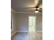 Inviting living room with neutral walls, clean lines, and light-colored floors, complemented by a ceiling fan at 1053 Metropolitan Parkway Southwest Sw Pkwy, Atlanta, GA 30310