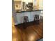 Kitchen island featuring bar seating, marble countertop, and open layout for easy access to stainless appliances at 2840 Peachtree Road Nw Nw Rd # 306, Atlanta, GA 30305
