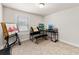Bright room with desk, easel, bench, and light-filled window at 4065 Holland Grove Rd, Lawrenceville, GA 30044