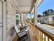 Charming porch with chairs and table, perfect for relaxing outdoors at 4065 Holland Grove Rd, Lawrenceville, GA 30044