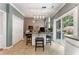 Eat-in kitchen island with granite countertop, sliding doors lead to back yard at 475 Chippenham Ct, Alpharetta, GA 30005