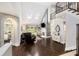 Spacious living room with hardwood flooring, skylights and staircase at 6300 Brookside Pl, Roswell, GA 30076