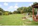 Expansive backyard with mature trees at 1587 Cronic Town Rd, Auburn, GA 30011