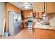Bright kitchen with stainless steel refrigerator, and plenty of cabinet space at 1587 Cronic Town Rd, Auburn, GA 30011