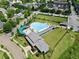 Aerial view of community pool area, surrounded by lush greenery and neighborhood homes at 1954 Summit Trace Circle Northwest, Atlanta, GA 30318