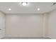 Unfinished basement with carpet and access door at 1954 Summit Trace Circle Northwest, Atlanta, GA 30318