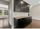 A granite countertop and dark cabinets provide ample counter space and storage at 1954 Summit Trace Circle Northwest, Atlanta, GA 30318