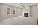Spacious living room features a fireplace, and large windows at 1954 Summit Trace Circle Northwest, Atlanta, GA 30318