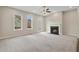 Bright living room with fireplace and access to the outdoor balcony at 1954 Summit Trace Circle Northwest, Atlanta, GA 30318