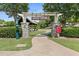 Stone entrance to Herman E. Perry Park with manicured hedges and lush green grass at 1954 Summit Trace Circle Northwest, Atlanta, GA 30318