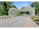 Entrance of the park featuring a unique art installation and lush greenery at 1954 Summit Trace Circle Northwest, Atlanta, GA 30318