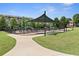 Large playground with a shaded seating area and mature trees at 1954 Summit Trace Circle Northwest, Atlanta, GA 30318