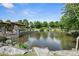 Picturesque pond with a stone overlook, lush greenery and a fountain at 1954 Summit Trace Circle Northwest, Atlanta, GA 30318
