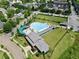 Aerial view of a community pool with ample seating and well-maintained green spaces at 1954 Summit Trace Circle Northwest, Atlanta, GA 30318