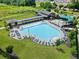 Stunning aerial view of the community pool, surrounded by lounge chairs and lush landscaping at 1954 Summit Trace Circle Northwest, Atlanta, GA 30318