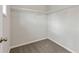 Carpeted walk-in closet with wire shelving, creating an organized storage space at 1954 Summit Trace Circle Northwest, Atlanta, GA 30318