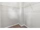 Spacious walk-in closet with ample storage space and wire shelving for organization at 1954 Summit Trace Circle Northwest, Atlanta, GA 30318