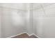 Spacious walk-in closet featuring wire shelving for optimal storage organization at 1954 Summit Trace Circle Northwest, Atlanta, GA 30318
