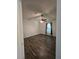 Bedroom with a ceiling fan and natural light from the window, featuring hardwood floors at 101 Royal Way, Mcdonough, GA 30252