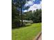 Charming single-story home with well-manicured front lawn and mature trees at 101 Royal Way, Mcdonough, GA 30252