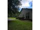 Exterior view showing siding and large windows that flood the space with natural light at 101 Royal Way, Mcdonough, GA 30252