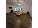 Bright living room with fireplace, wood floors, and natural light at 101 Royal Way, Mcdonough, GA 30252