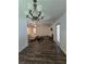 Expansive living room showcases a cozy fireplace, abundant natural light, and stylish flooring at 101 Royal Way, Mcdonough, GA 30252