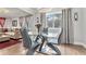 Contemporary dining room with modern table and chairs, hardwood floors and stylish chandelier at 232 Whitworth Sw Dr, Atlanta, GA 30331