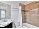 Modern bathroom with tiled shower, updated sink and fixtures at 326 Brownstones Ne Cir, Atlanta, GA 30312