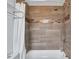 Modern bathroom featuring a tiled shower, updated sink and fixtures at 326 Brownstones Ne Cir, Atlanta, GA 30312